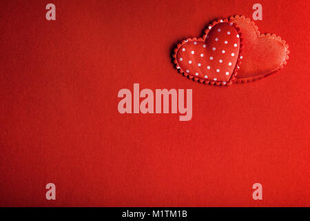Red background image with two hearts Stock Photo