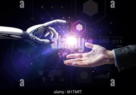 robot and human hand over virtual projection Stock Photo