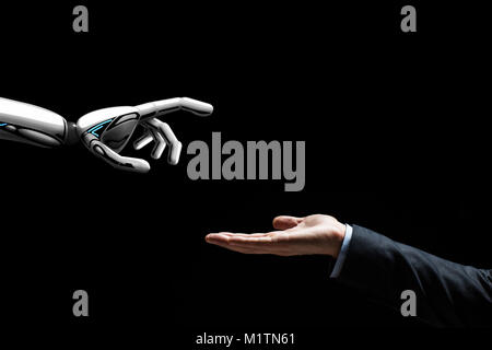 robot and human hand on black background Stock Photo