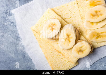 Light Healthy Snack made from Banana Slices, Cashew Butter and Gluten Free Crispbreads Stock Photo