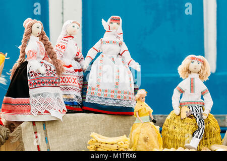 Folk Belarusian souvenirs. Dolls made of cloth in the national Belarusian dress Stock Photo