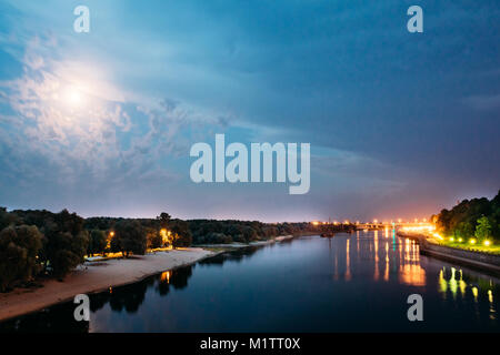 Night view of the river Sozh with night light reflections in the water of the river Stock Photo