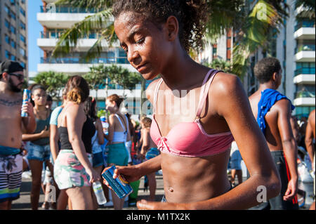 RIO DE JANEIRO - CIRCA FEBRUARY, 2017: Young Brazilians celebrate at a Carnival street party in Ipanema. Stock Photo