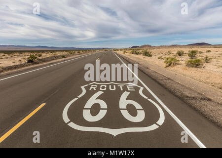 Historic Route 66 pavement sign near Amboy in the California Mojave desert. Stock Photo