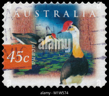 BUDAPEST, HUNGARY - 17 january 2018: stamp printed in AUSTRALIA shows image of comb-crested jacana, circa 1997 Stock Photo