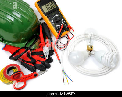 Safety equipment, work tools and components for a residential electrical installation, photographed on a white background. Stock Photo