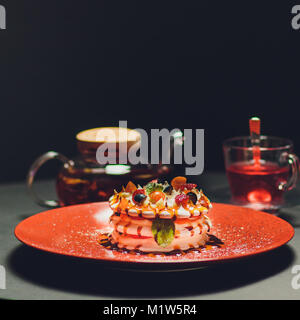 cake on a black background closeup color Stock Photo