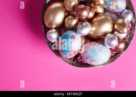 Close up of easter eggs in basket Stock Photo