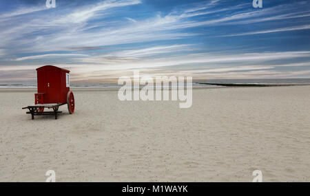 red wooden cart on the beach on the island of borkum Stock Photo