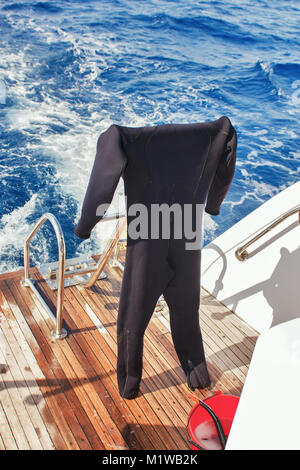 Equipment for scuba diving on boat of ship. Stock Photo