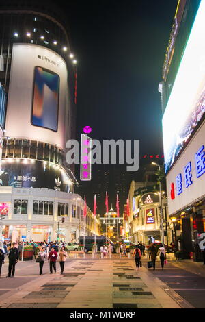 GUANGZHOU, CHINA - JANUARY 2, 2018: Beijing Road Pedestrian Street in old part of Guangzhou with many stores and restaurants at night Stock Photo