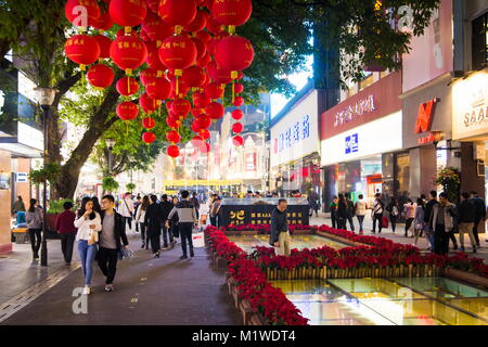 GUANGZHOU, CHINA - JANUARY 2, 2018: Beijing Road Pedestrian Street in old part of Guangzhou crowded with people and decorated for Spring festival at n Stock Photo