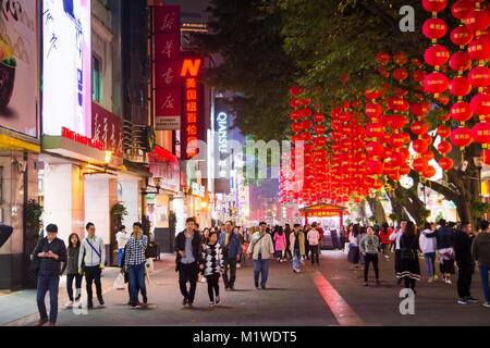 GUANGZHOU, CHINA - JANUARY 2, 2018: Beijing Road Pedestrian Street in old part of Guangzhou crowded with people and decorated for Spring festival at n Stock Photo