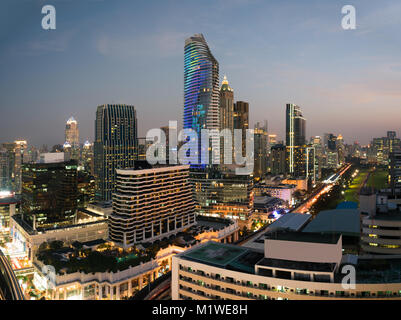 Modern building in Bangkok business district at Bangkok city with skyline before sunset, Thailand. Stock Photo