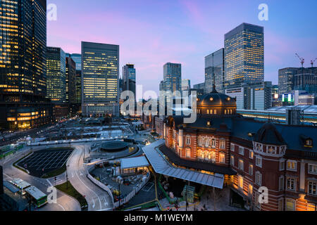 Tokyo, Japan at the Marunouchi business district and Tokyo railway station highrise building at twilight time in Japan. Stock Photo