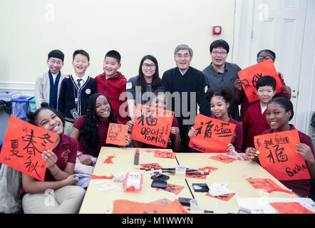 New York, USA. 2nd Feb, 2018. Students from Beijing and Medgar Evers College Preparatory School of New York take a group photo after a culture exchange event in New York, the United States, Feb. 2, 2018. Nearly 100 students from China and U.S. met together and enjoyed themselves at the event of learning and experiencing Chinese traditional culture as the Chinese Lunar New Year is coming. Credit: Wang Ying/Xinhua/Alamy Live News Stock Photo