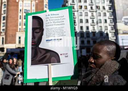 Madrid, Spain. 3rd Feb, 2018. A woman with a placard that reads 'International day of zero tolerance with female genital mutilation' protesting against female genital mutilation in Madrid, Spain. Credit: Marcos del Mazo/Alamy Live News Stock Photo