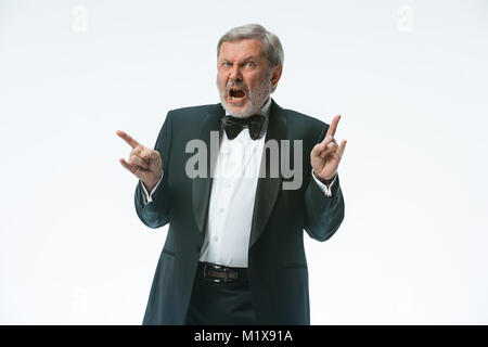 older businessman in a suit with a bow tie, isolated over white Stock Photo