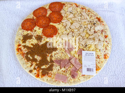 A freshly prepared create your own pizza bought in a Sainsbury's supermarket in Bangor Northern Ireland Stock Photo