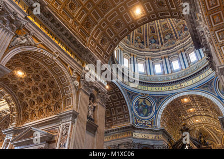 The ornate dome and ceiling of St. Peter's Basilica, Vatican Rome Italy
