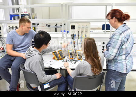technical vocational training in industry: young apprentices and trainers in the classroom Stock Photo