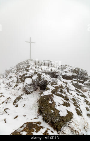 Summit of Grosser Arber mountain in the fog, Bavaria, Germany Stock Photo