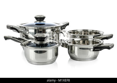 Group of premium stainless steel pots and pans isolated on a white background. Stock Photo