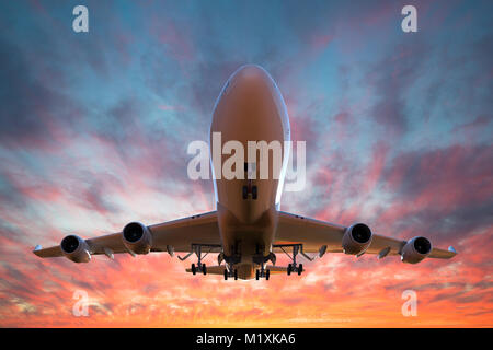 3D render of a passenger airplane on take off at sunset Stock Photo