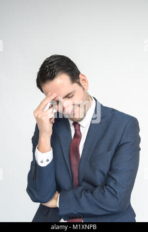 A smartly dressed man conveys a range of facial and bodily emotions, portrait/isolated  on a white background Stock Photo