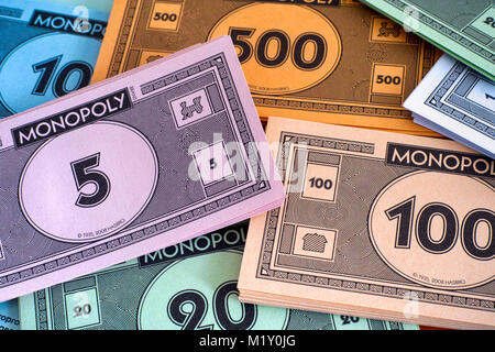 Tambov, Russian Federation - January 26, 2018 Monopoly money packs. Full frame. Studio shot. Stock Photo