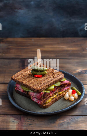 pastrami sandwich with pickle, top view Stock Photo