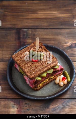 pastrami sandwich with pickle, top view Stock Photo