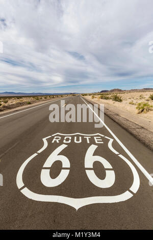 Route 66 pavement sign near Amboy deep in the California Mojave Desert. Stock Photo