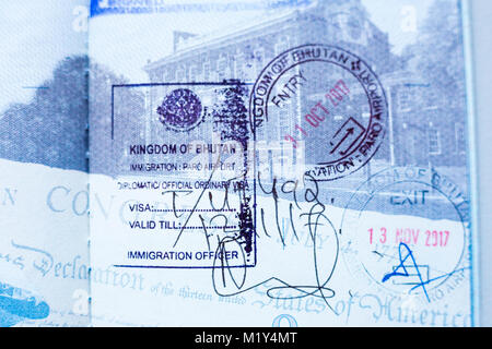 Bhutan.  Entry and Exit Stamps in American Passport. Stock Photo