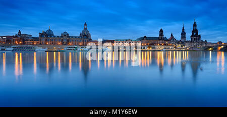 City view with art academy, Frauenkirche, Hofkirche and Residenzschloss, reflection in the Elbe river at dusk, old town, Dresden Stock Photo