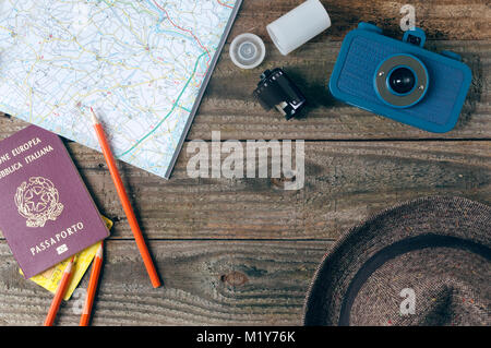 Travel accessories on wooden table with copy space Stock Photo