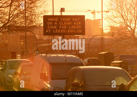 traffic passing digital advert asking for public consultation on a clean air zone for leeds city centre yorkshire united kingdom Stock Photo