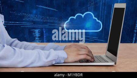 Hands using laptop and cloud icon with technology background Stock Photo