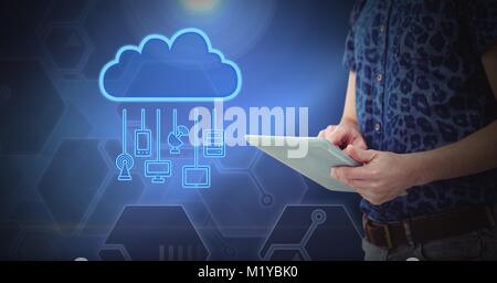 Digital composite of Hand holding tablet with cloud icon and hanging connection devices Stock Photo