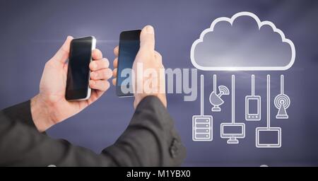 Hand holding phones with cloud icon and hanging connection devices Stock Photo