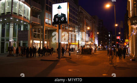 BERLIN, GERMANY - JAN 17th, 2015: Former bordercross checkpoint Charlie in Berlin. It's the best-known Berlin Wall crossing point between East and West Berlin during the Cold War Stock Photo