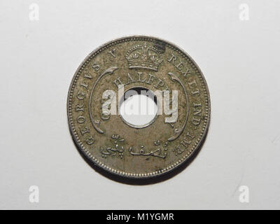 A 1915 one halfpenny coin from British West Africa Stock Photo