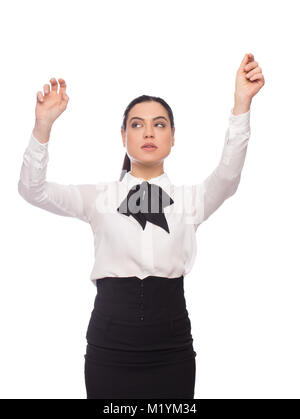 Young smart businesswoman working on imaginary futuristic screen, isolated on white Stock Photo