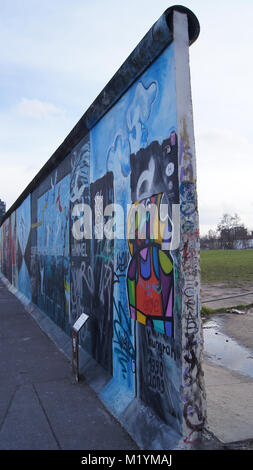 BERLIN, GERMANY - JAN 17th, 2015: Berlin Wall was a barrier constructed starting on 13 August 1961. East Side Gallery is an international memorial for freedom Stock Photo