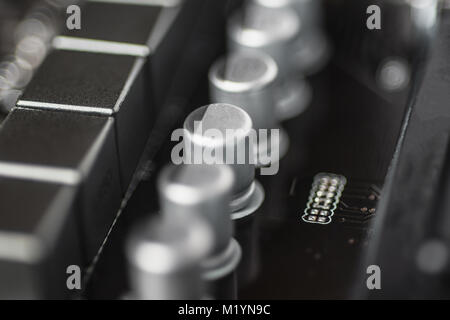 Capacitors Close Up. Computer Motherboard Background. Printed Circuit Board. Stock Photo