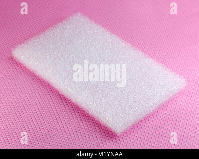 Shockproof material Polyethelene foam on pink background Stock Photo