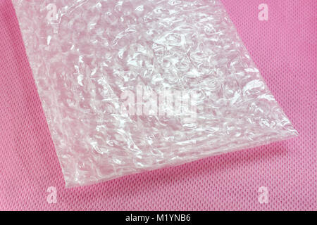 Shockproof material - Air Bubble Sheet on pink background Stock Photo