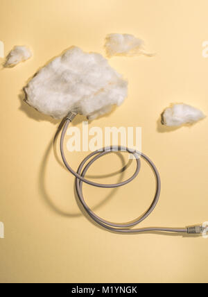 Clouds conception with cotton cloud and USB cable Stock Photo