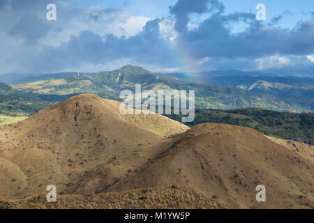 Beautiful afternoon mountain views with a rainbow  in Guanacaste, Costa Rica Stock Photo