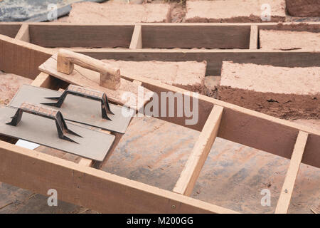 Hand made bricks with clay. Prepare mud for make bricks. Stock Photo